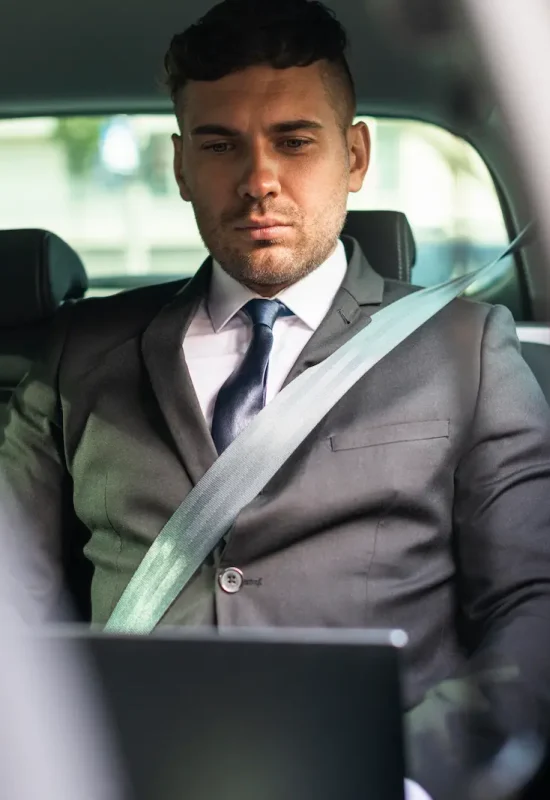 business-man-car-working-laptop